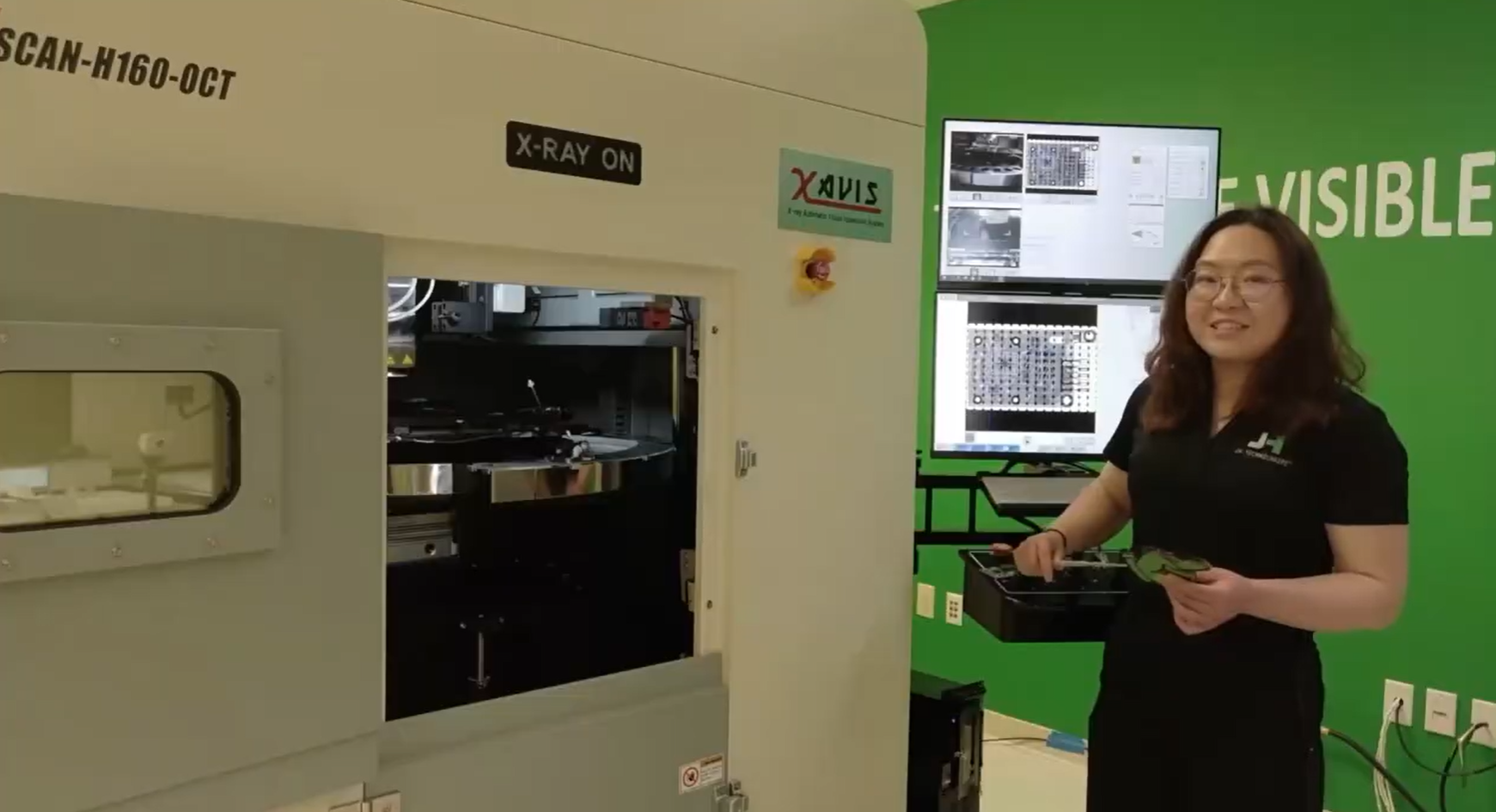 Yifan Jiang demonstrating the XAVIS XSCAN H160 Oblique CT X-ray inspection system during a live webinar presentation.